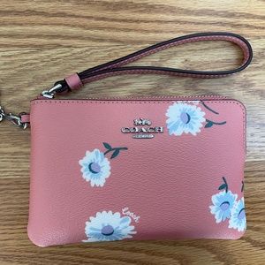 Coach daisy wristlet with charms
